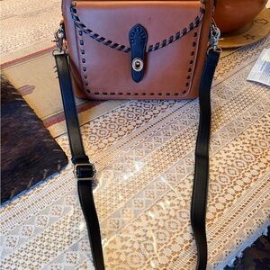 Brown and Black Leather Crossbody Bag

Genuine Leather - brand is Lady Conceal
